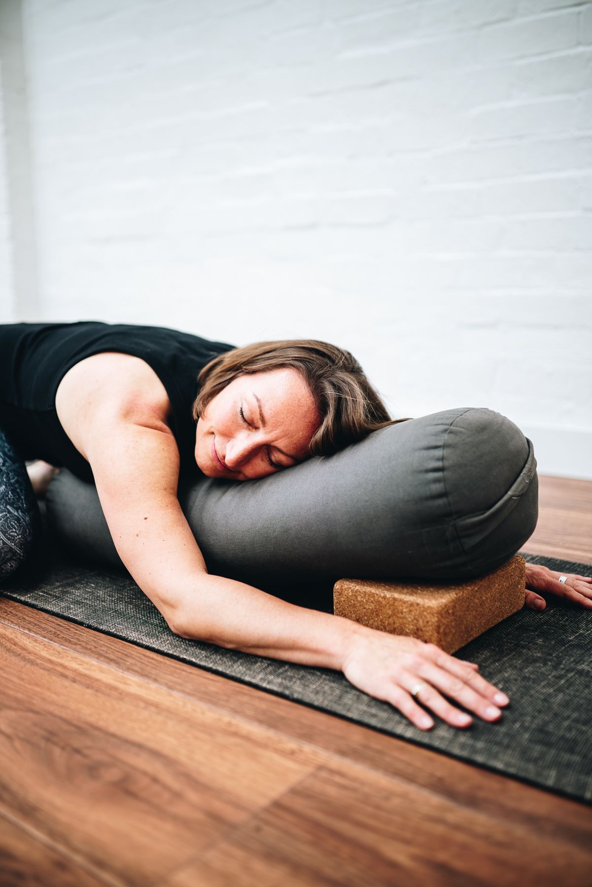 Yoga instructor doing stretches in a yoga studio during a professional branding photo session with Melbourne branding Photographer