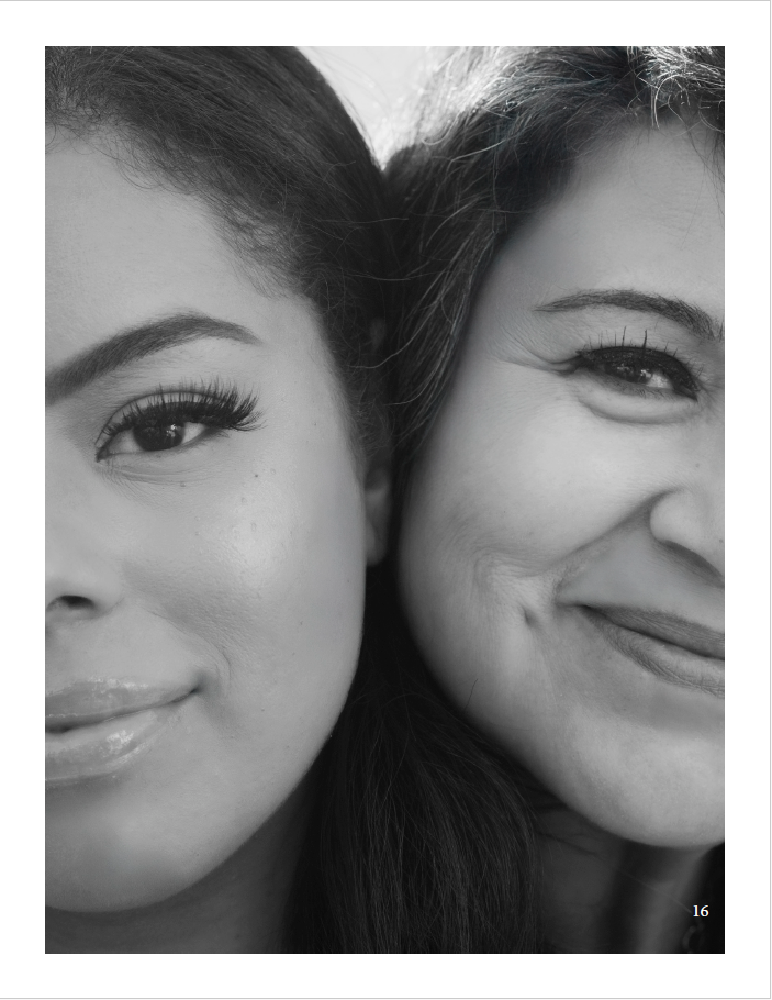 close up shot of mother and daughter smiling
