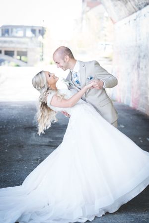 First Look Photos Bride and Groom. Downtown Grand Rapids Wedding Portraits. John Ball Zoo Weddings. Wedding Photography.