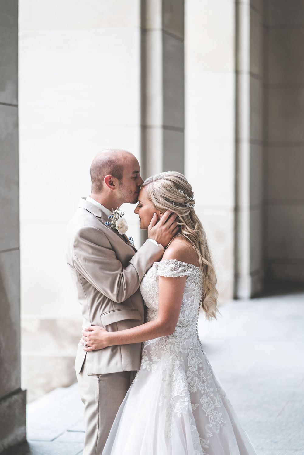 First Look Photos Bride and Groom. Downtown Grand Rapids Wedding Portraits. John Ball Zoo Weddings. Wedding Photography.
