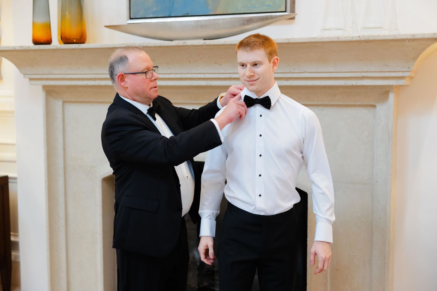 Father helping groom at BallenIsles Country Club in Palm Beach during a wedding photographed by Ohio photographer Tom Forrest.