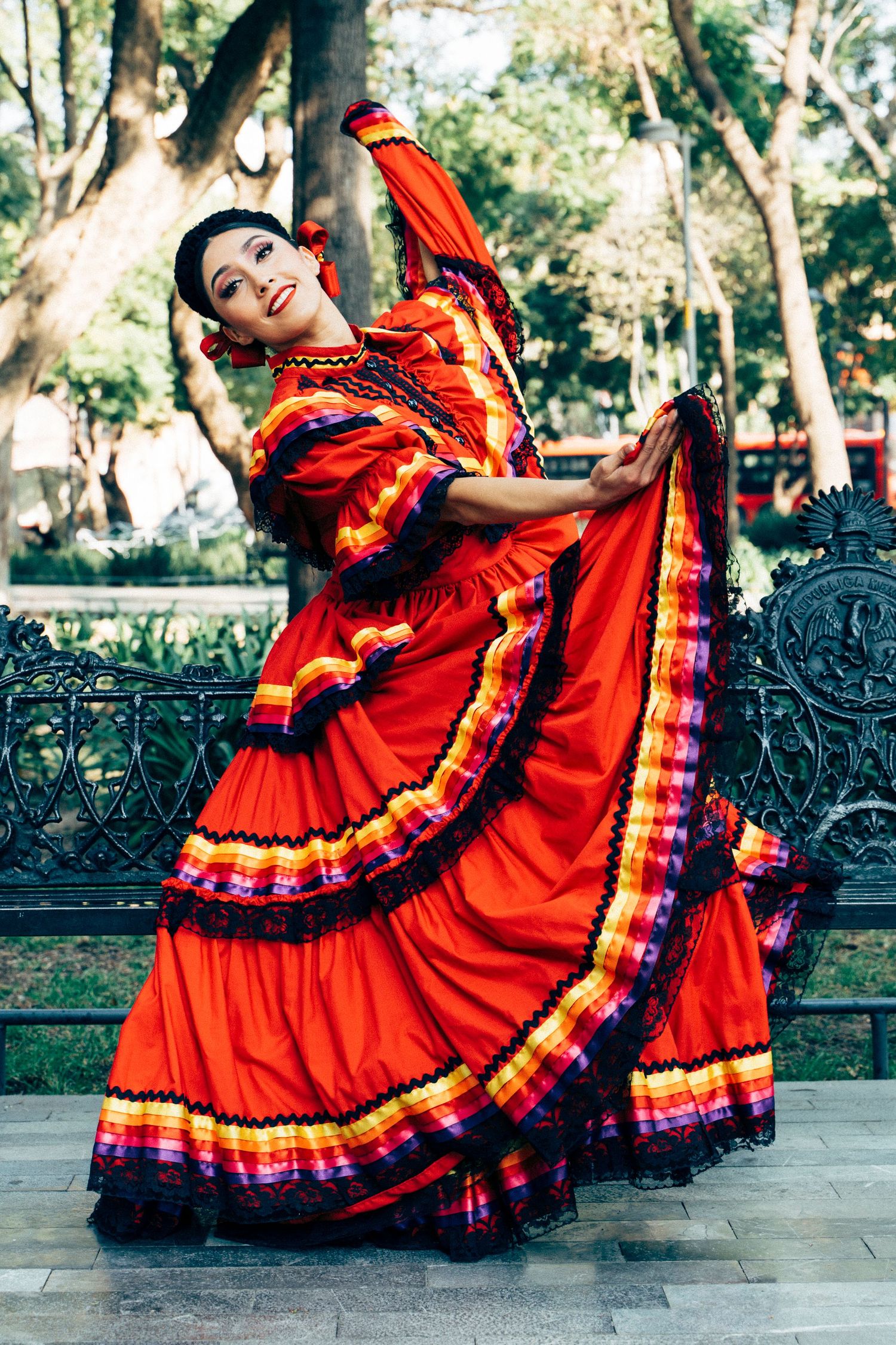 Ballet Folklórico de México dancer performing traditional steps in Alameda Central Park, Mexico City