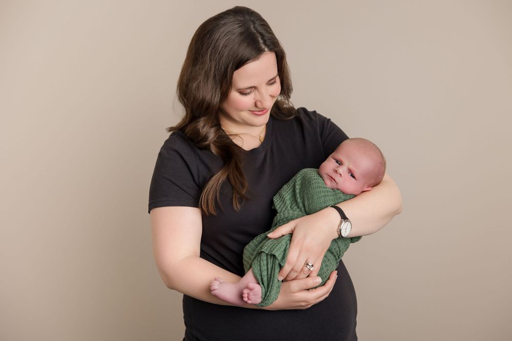 A series of intimate photos showing tender moments between parent and newborn in various nurturing poses.