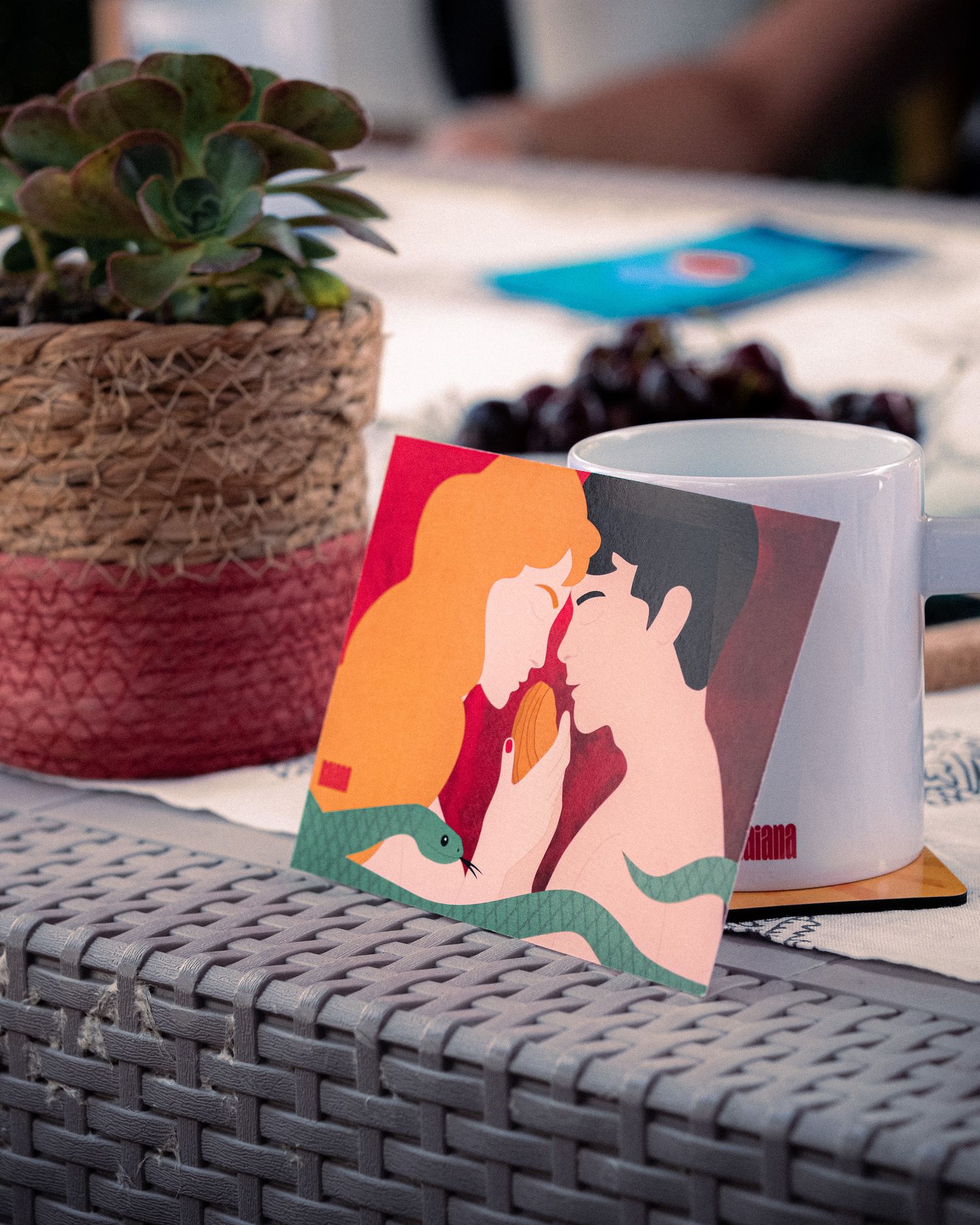 Colorful illustrated cards depicting romantic couples displayed on a textured surface.