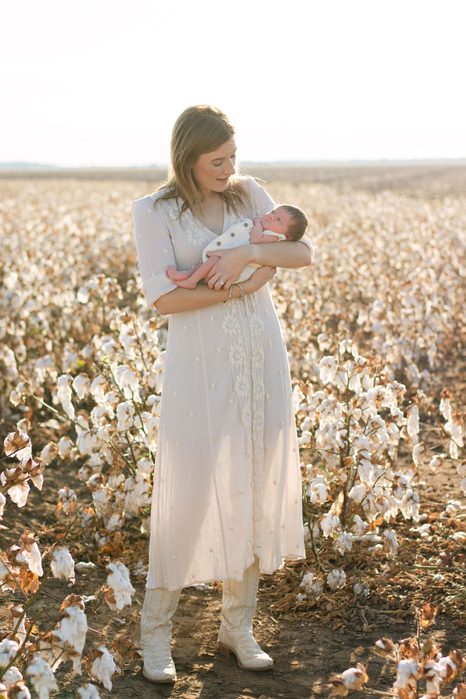 newborn maternity session in cotton field