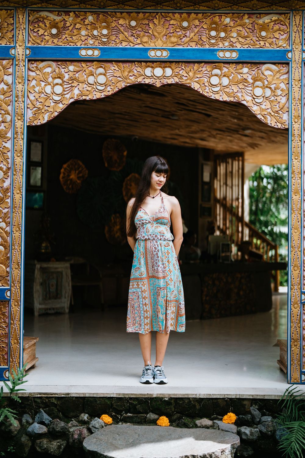 Ornate temple architecture with decorative gold details and traditional Asian design elements.