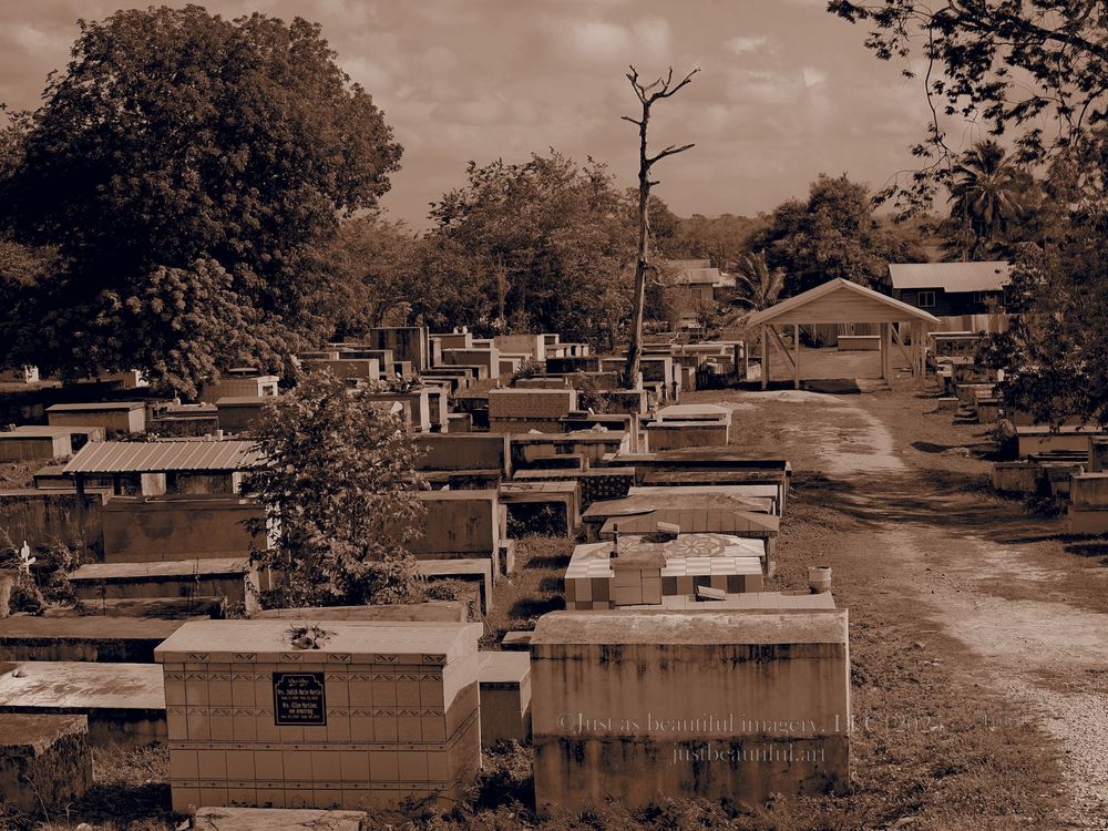 Faded photo of graveyard in Belize.