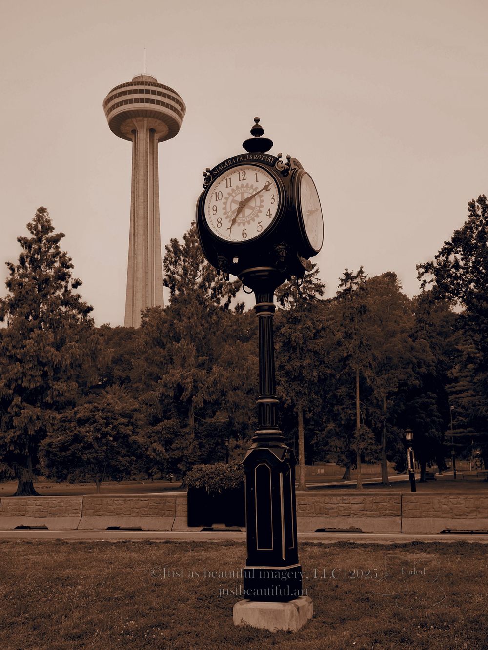 Faded photo of clock and tower.