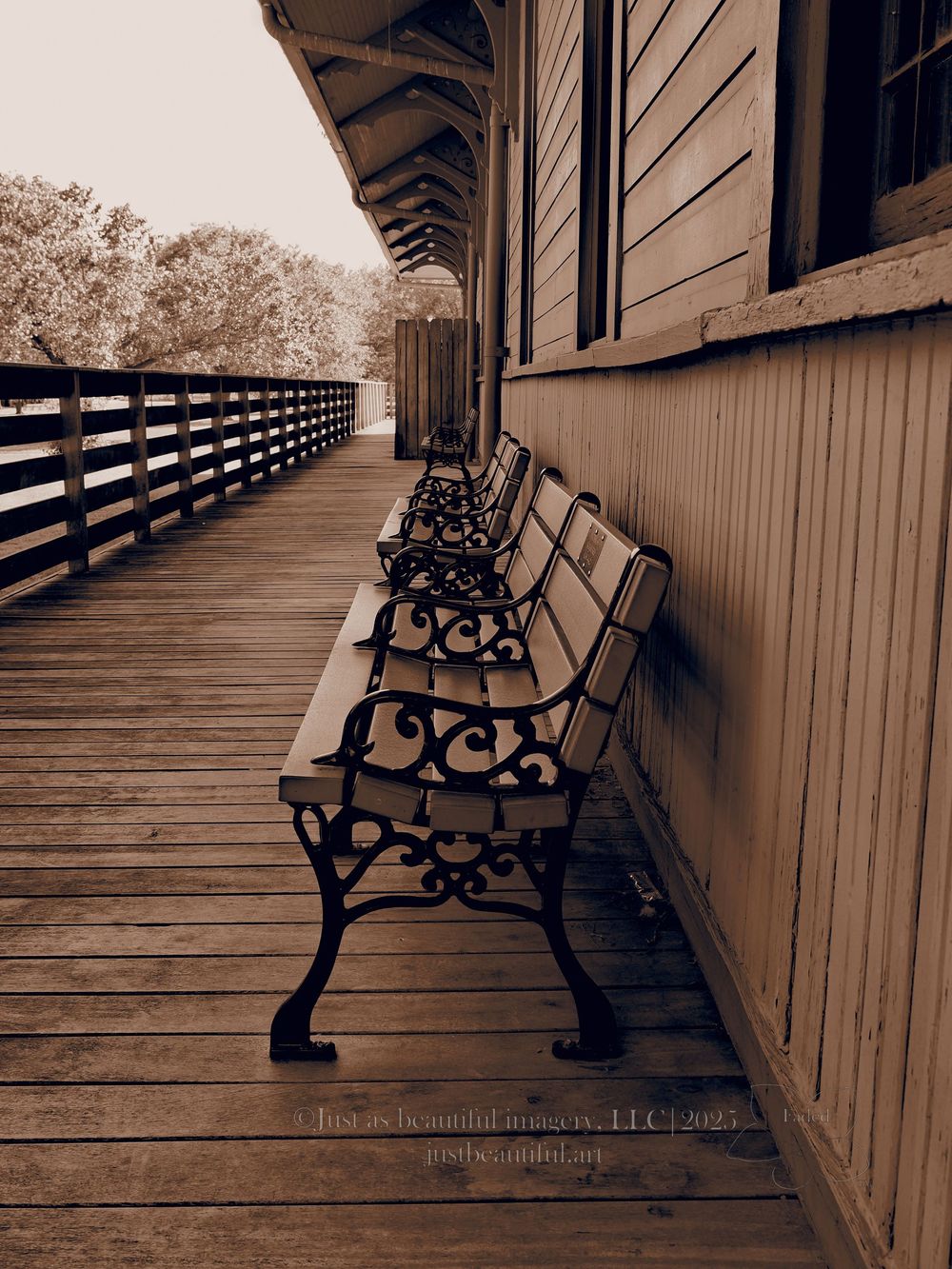 Faded photo of benches outside of old train depot in Saint Charles, Missouri.