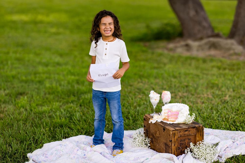 A series of photos showing a child playing outdoors in a park with a white dress and blue jeans.
