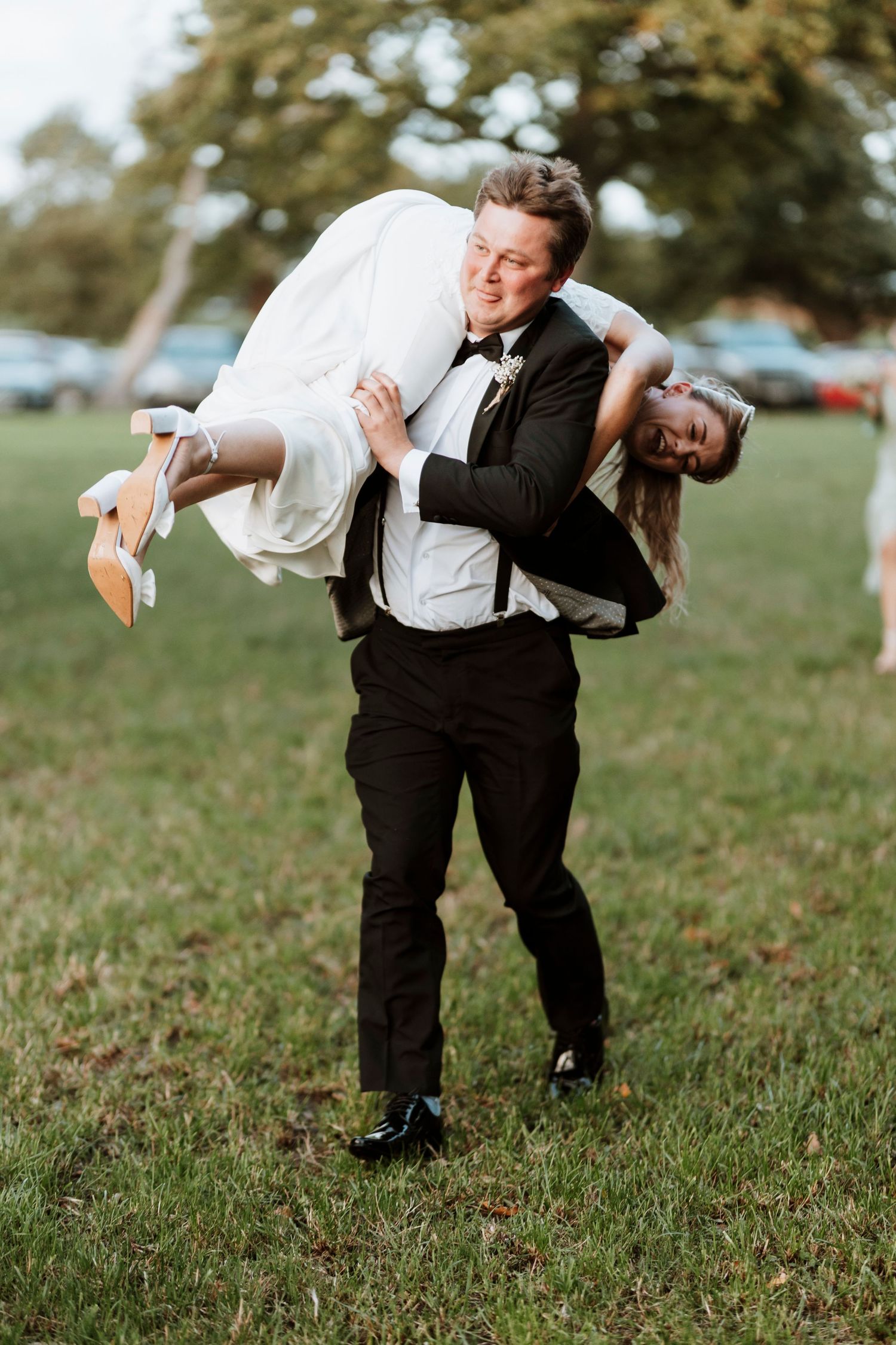 A playful sequence shows groomsman running off with bride