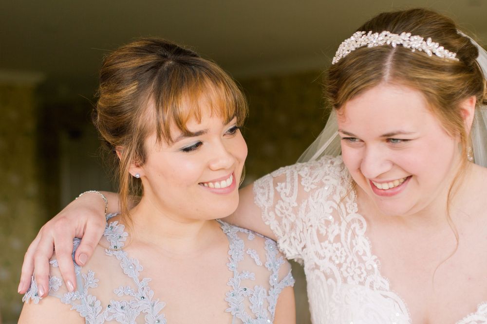 A series of tender moments captured in soft lighting showing close interactions between people in formal attire.
