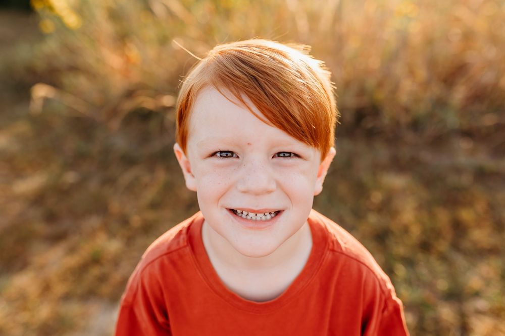 Boy posing for school portrait. Cincinnati and NKY School and Homeschool Portrait Photographer. A modern approach to picture day.