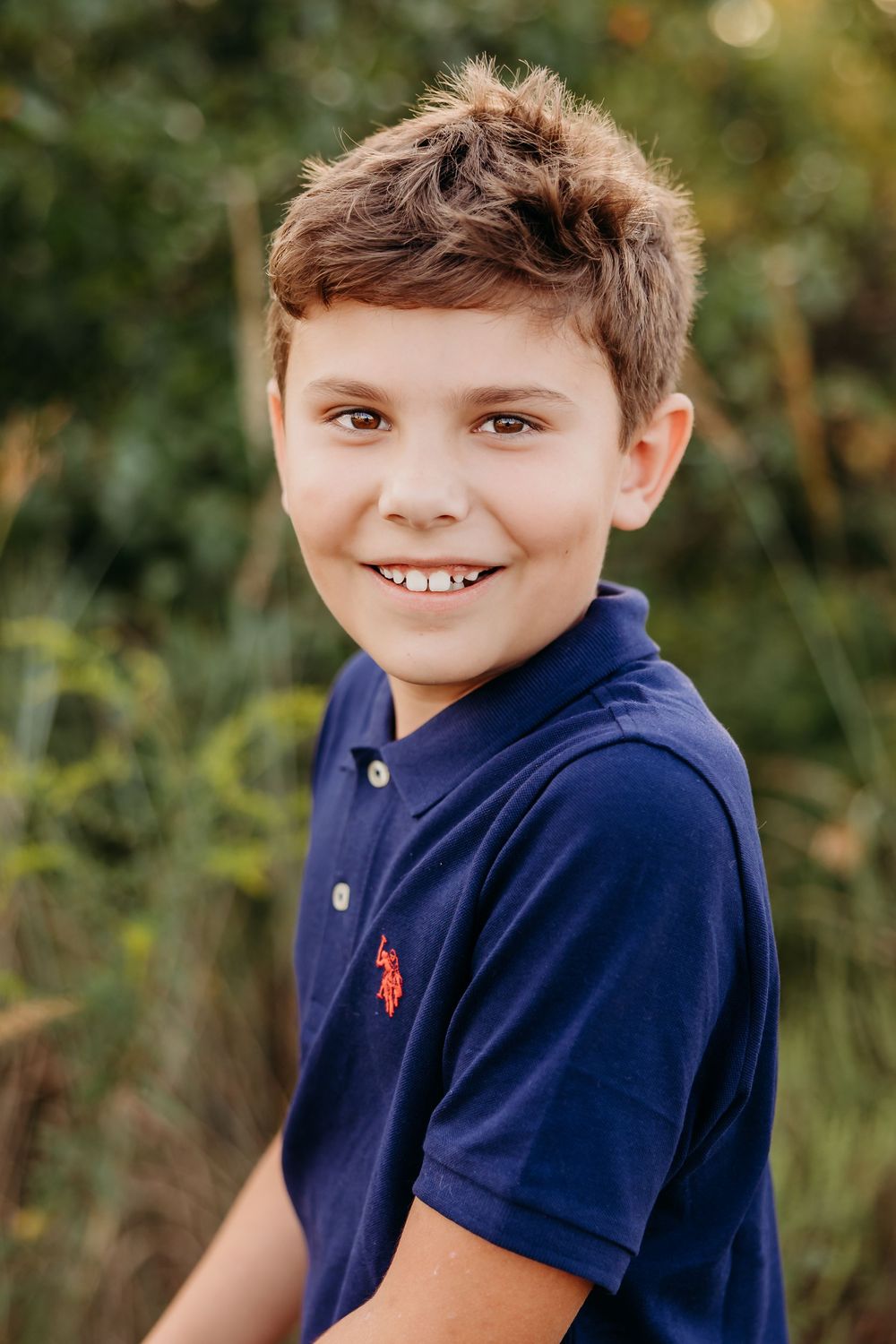 Boy posing for a school portrait. Cincinnati and NKY School and Homeschool Portrait Photographer. A modern approach to picture day.