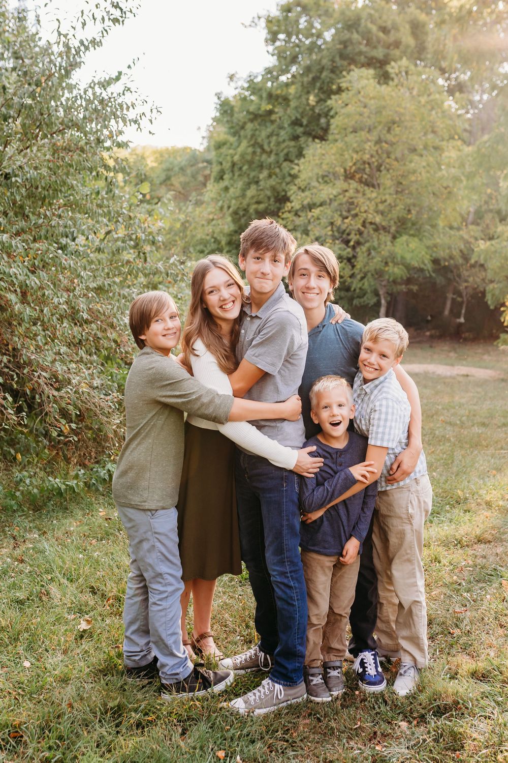 Siblings posing for a portrait. Cincinnati and NKY School and Homeschool Portrait Photographer. A modern approach to picture day.