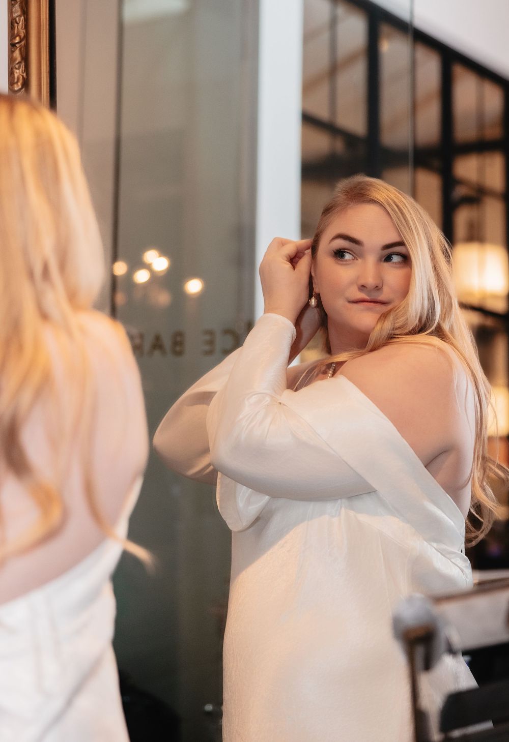 A series of profile shots showing a person with blonde hair in a white top against a blurred interior background.