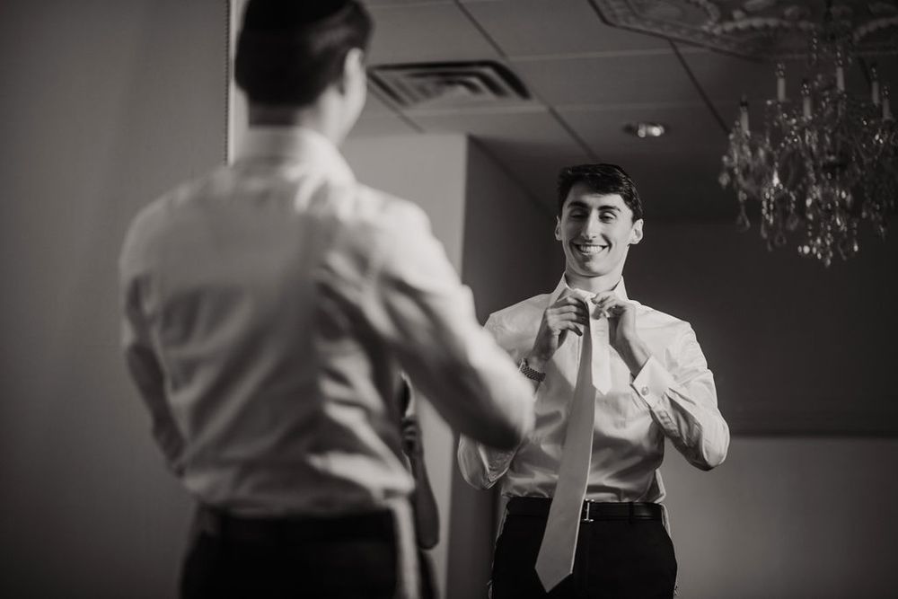 Black and white photo sequence showing dance moves in six progressive frames against a dark background.