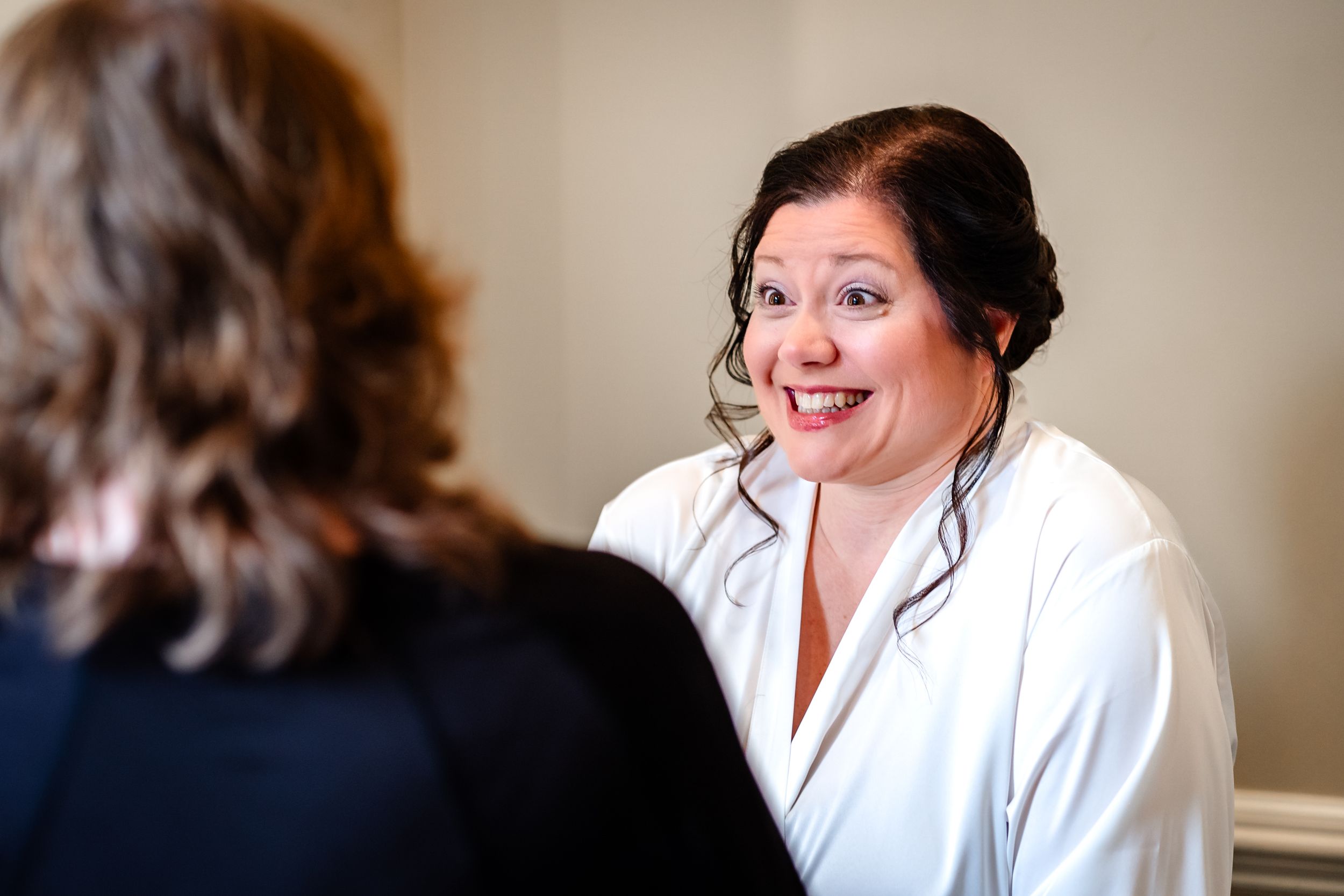 Wedding morning preparation moments captured in candid shots.