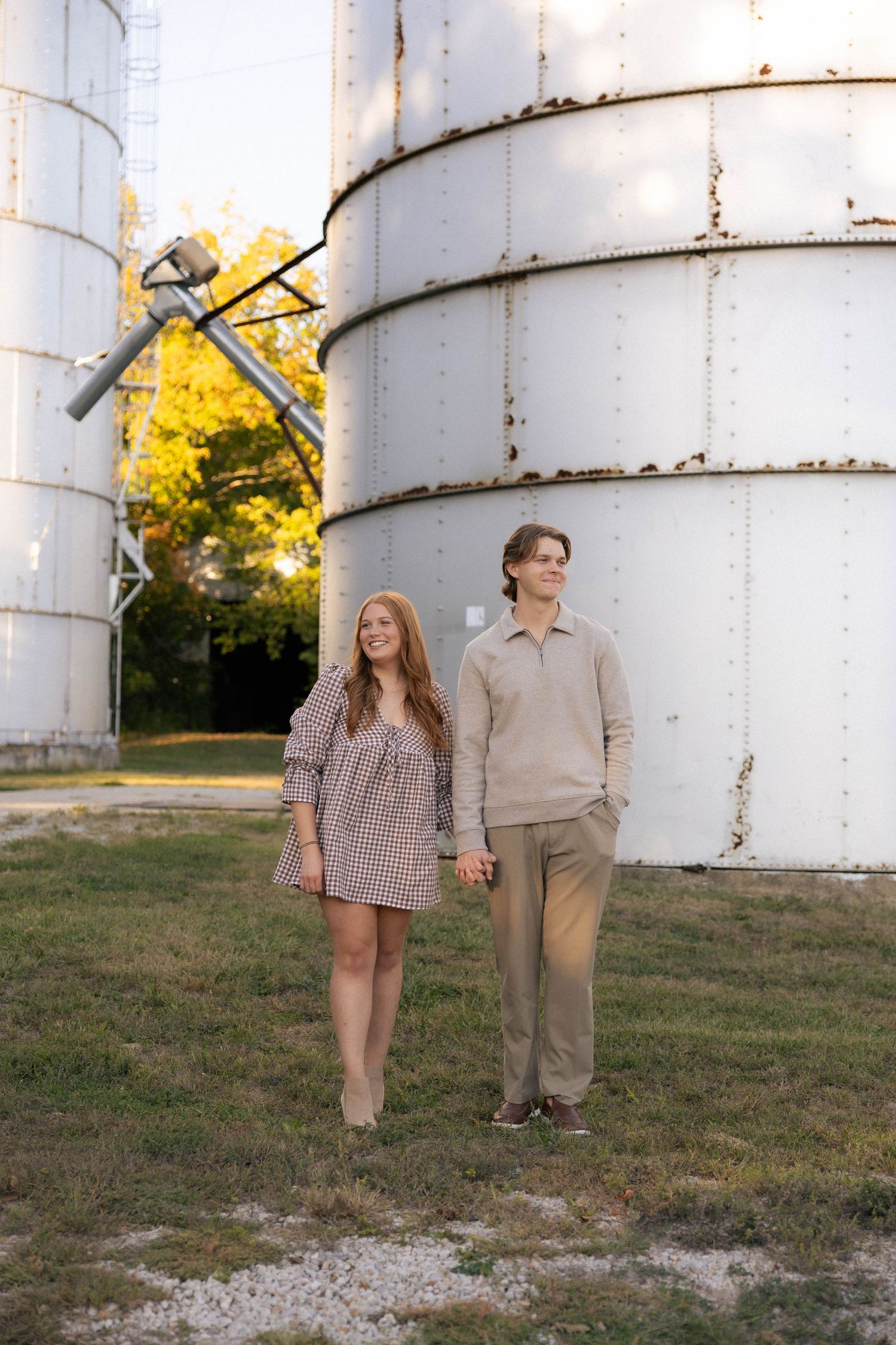 Fall outdoor golden hour engagement photos in front of silos in Funks Grove, Illinois