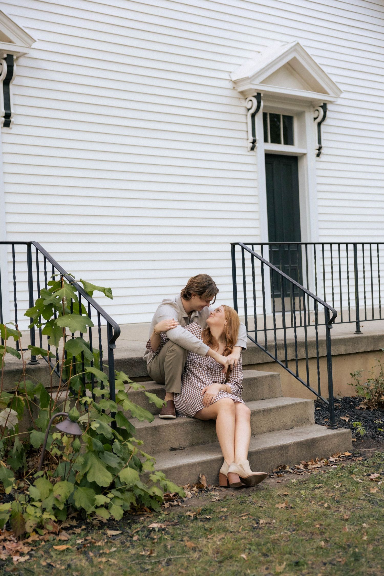 Fall outdoor golden hour engagement photos in front of chapel in Funks Grove, Illinois