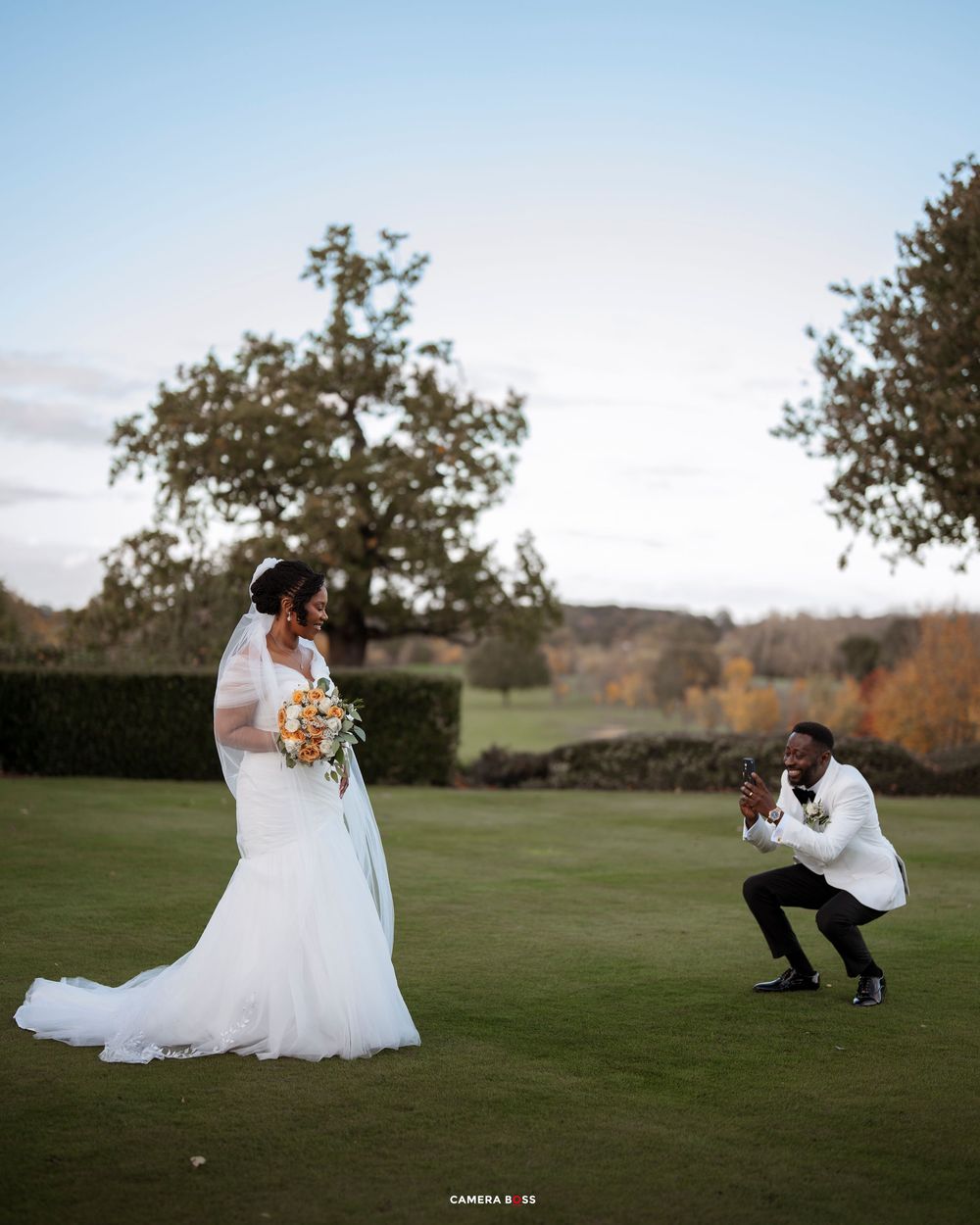 A series of wedding photos showing a couple playfully posing together on a grassy field during sunset.