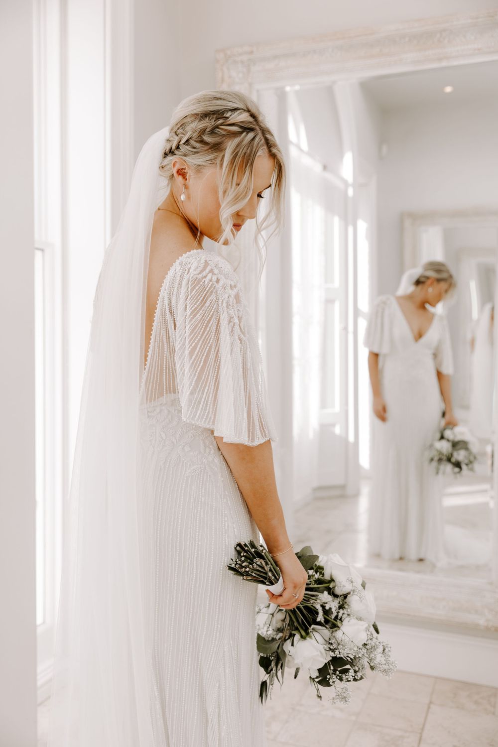 Wedding Photographer Sussex bride flowers bouquet