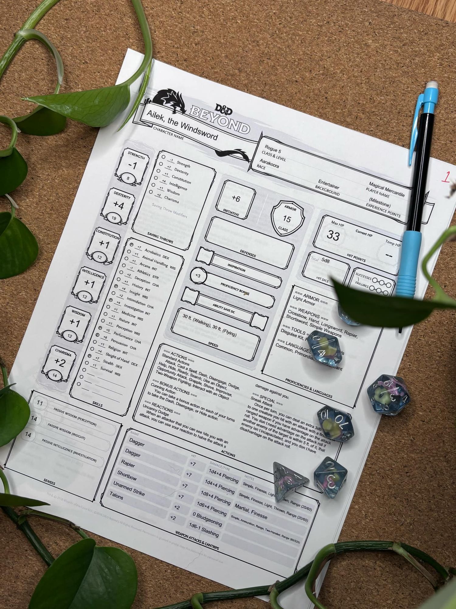 character sheet surrounded by pothos plant with dice and pencil