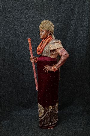 Photography Oil painting Side view of Rivers bride with beaded staff and velvet garment.