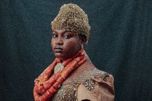 Photography Oil painting Portrait of a Rivers Bride in a royal attire with coral beads and cap.