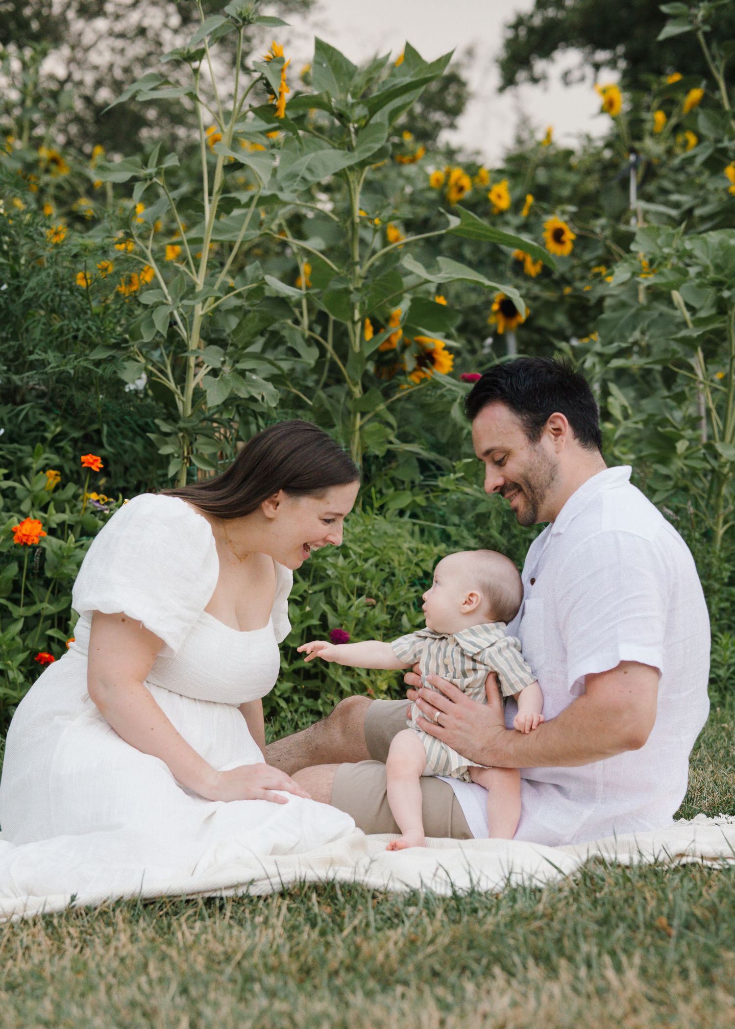 Family of three at Barclay Farmstead, a family-friendly photography location in Cherry Hill.