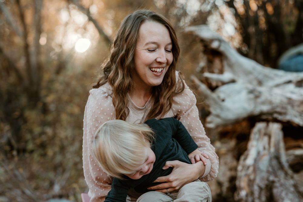 An intimate family portrait session with warm lighting and natural surroundings.