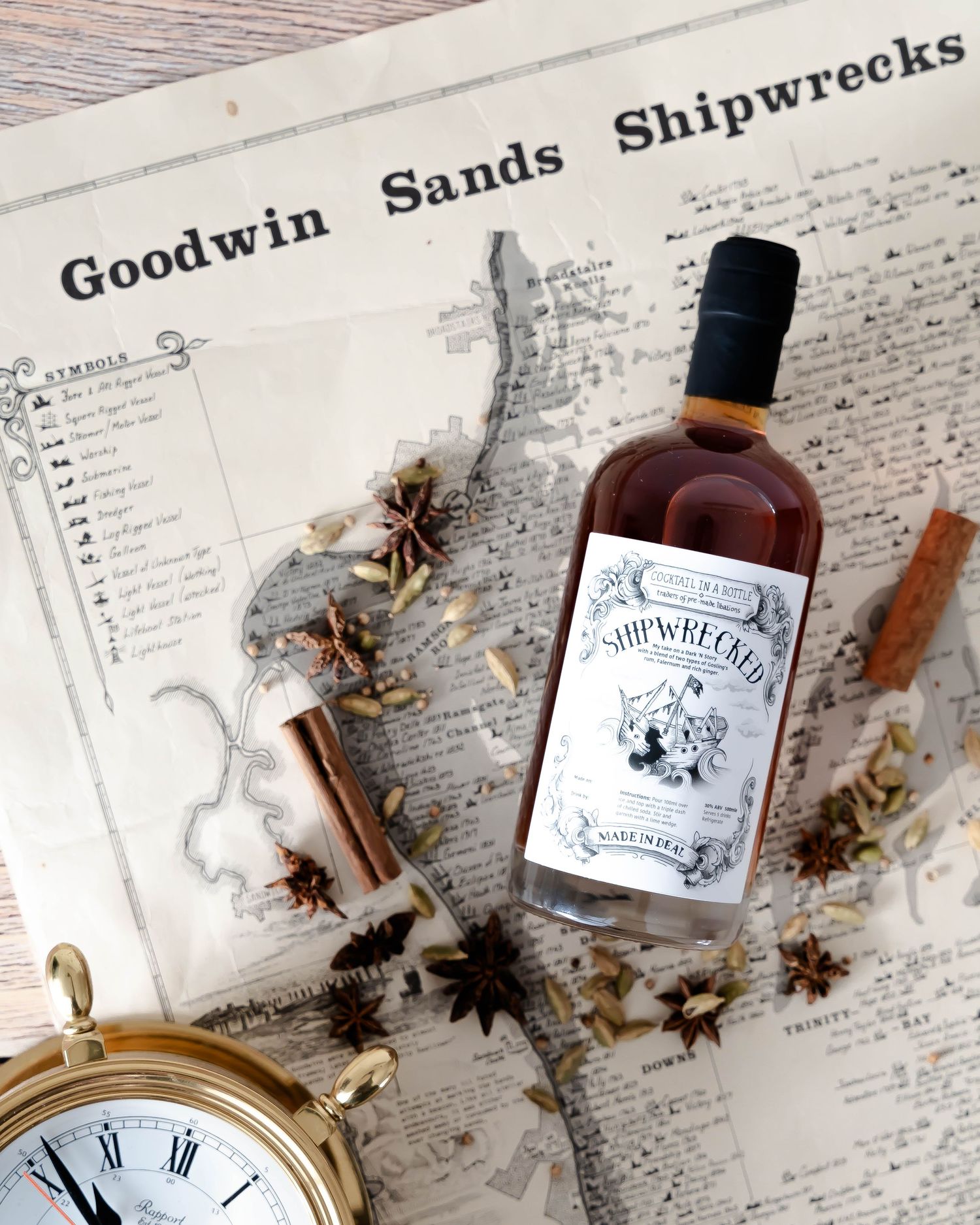 cocktail bottle product image for social media content styled with props