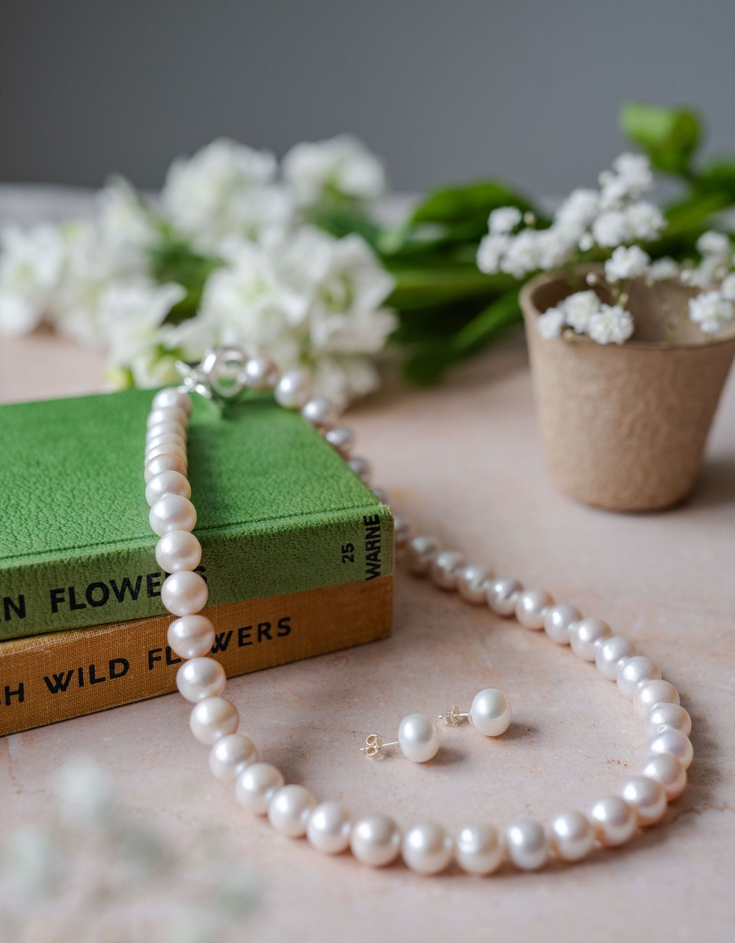 styled product photography at studio with props for jewellery creative maker