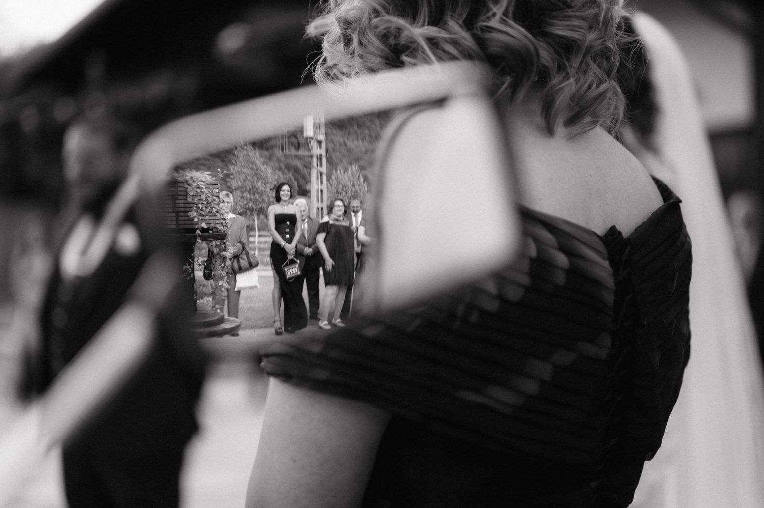 Black and white artistic shots capturing intimate wedding moments during a celebration.