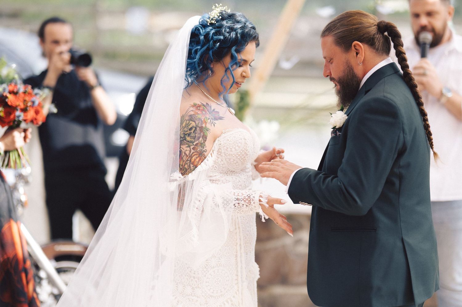 Joyful wedding couple shares an intimate first dance moment at their reception celebration.