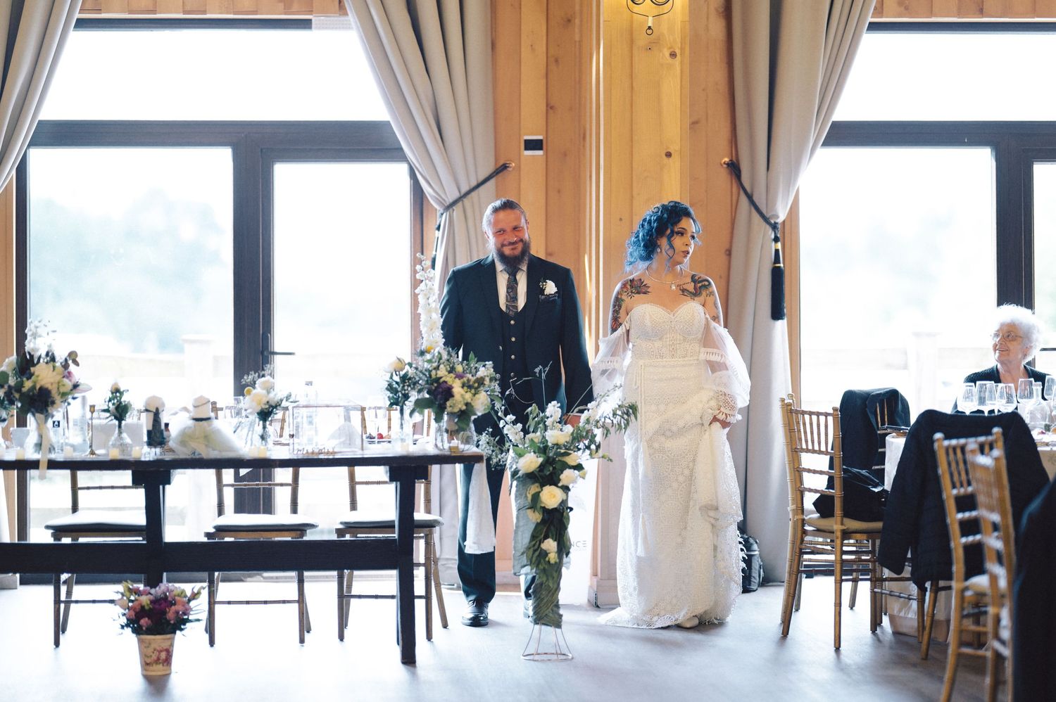 Three images showing an elegant wedding reception setting at a venue with large windows and beautiful drapes.