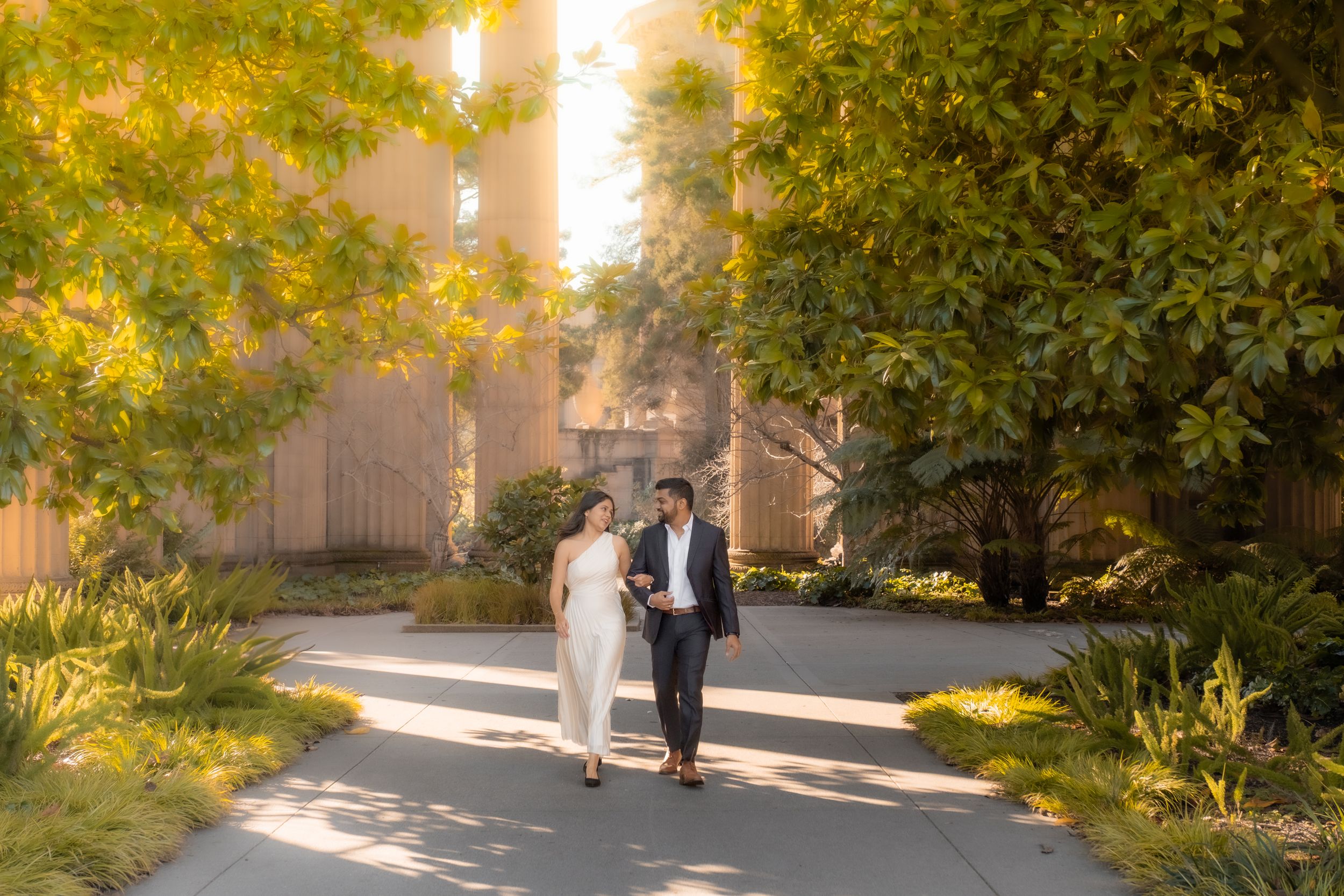 engaged couple candid moment at the Palace of Fine Arts.