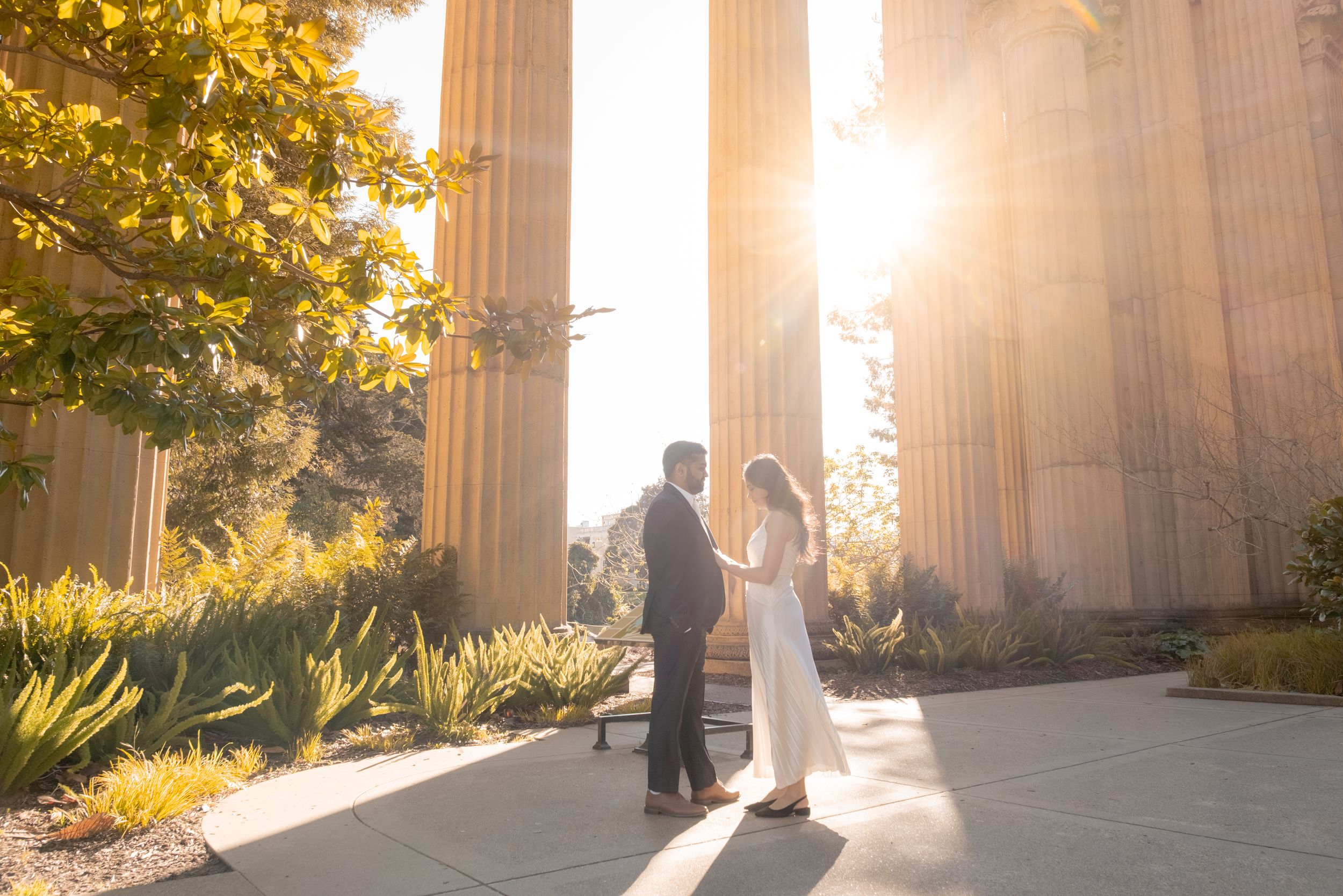 engaged couple candid moment at the Palace of Fine Arts.
