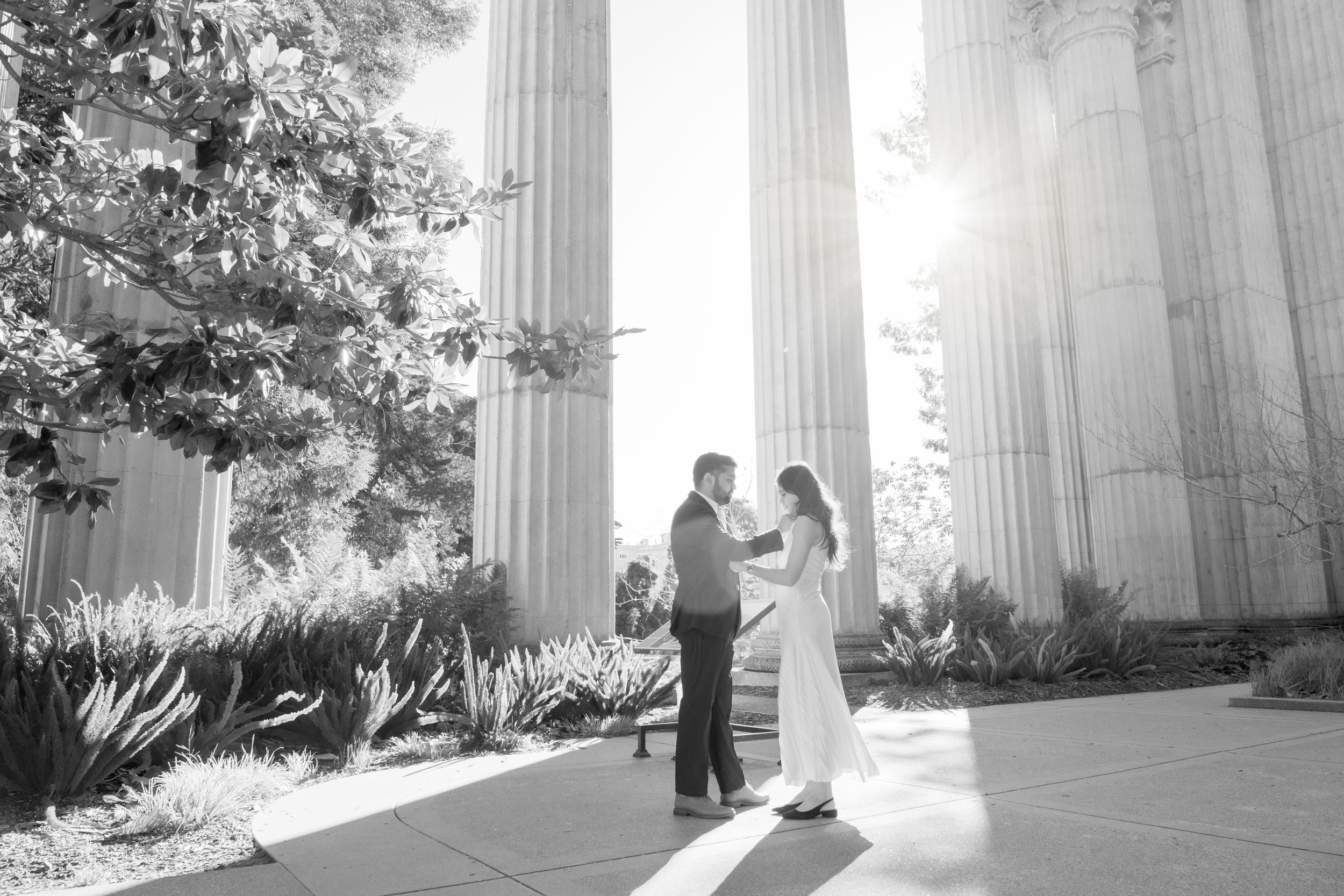 engaged couple candid moment at the Palace of Fine Arts.