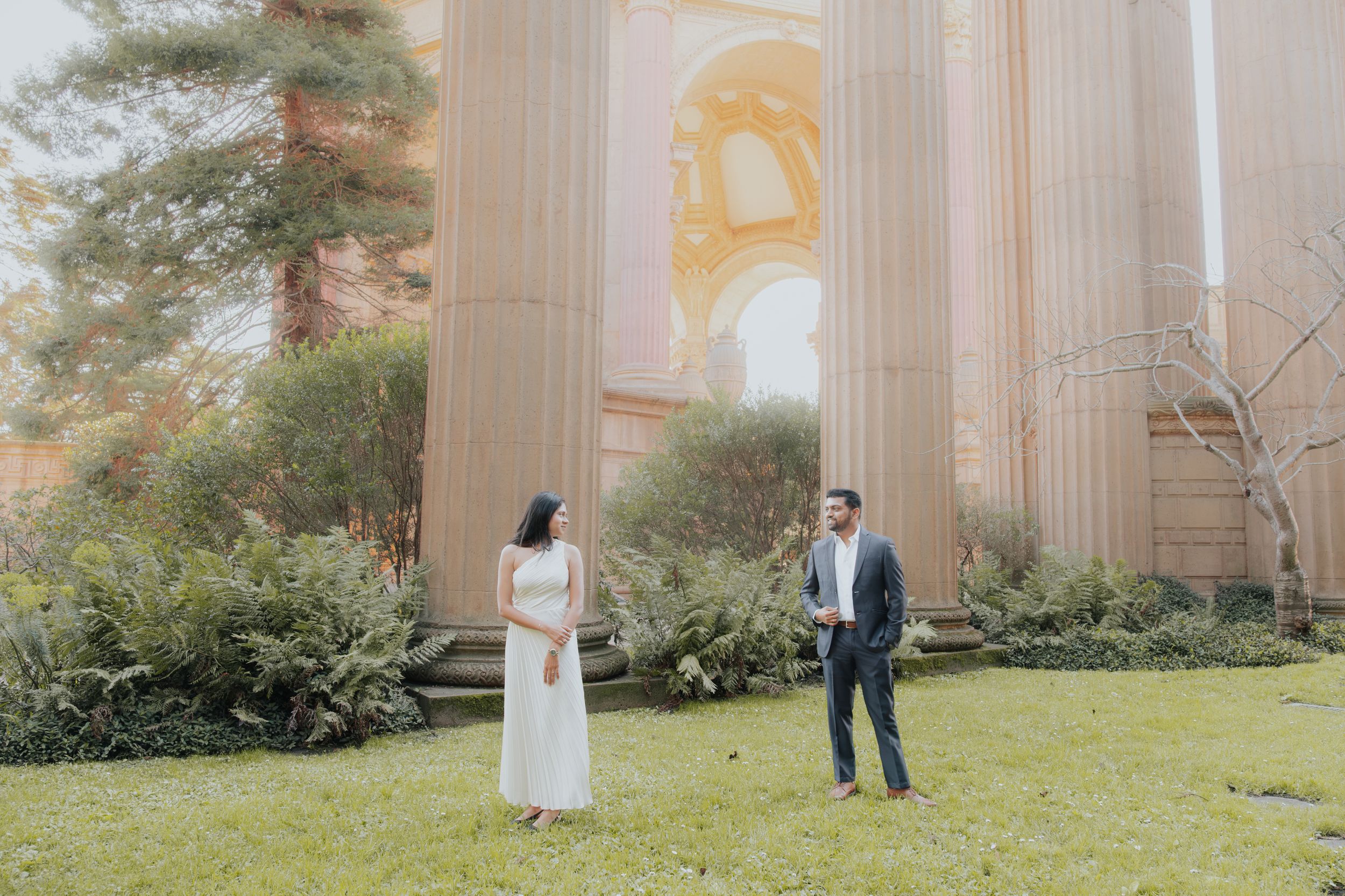 engaged couple candid moment at the Palace of Fine Arts.