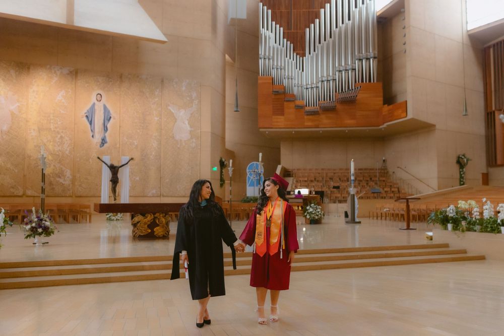 Interior view of a modern church sanctuary with organ pipes and architectural details.