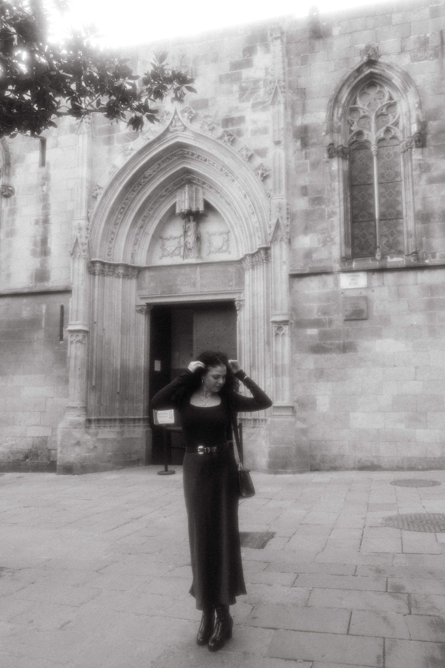 Black and white photos of a gothic church entrance with ornate stone archways and architectural details.