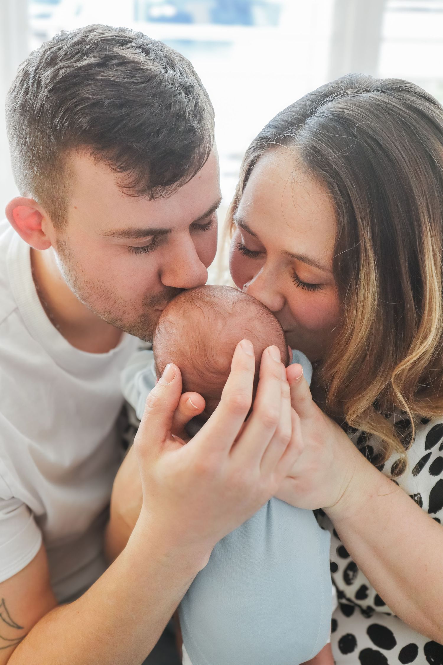 Intimate close-up moments shared between a couple indoors.