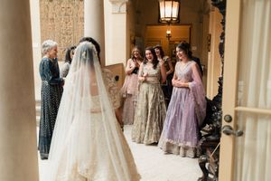A bride greets friends at Cuneo Mansion wedding.