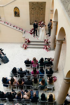 A bride and groom during the wedding ceremony at Cuneo Mansion.