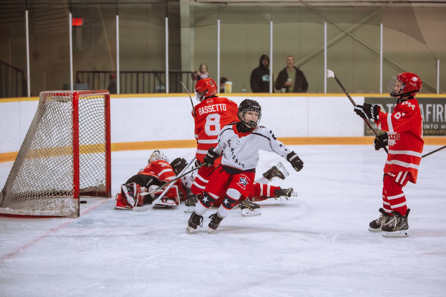 Hockey team celebrating win – Parksville youth hockey photography
