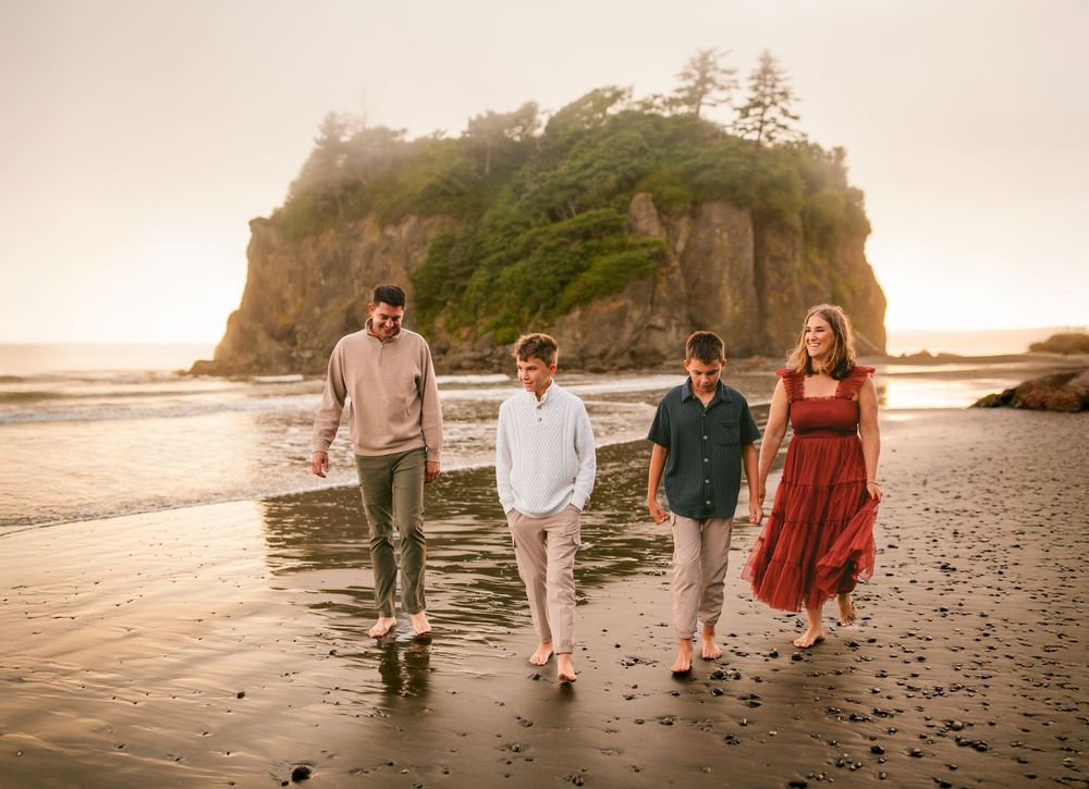 Family walking together during their family adventure photography session at Ruby Beach in Olympic National Park near Seattle, Washington