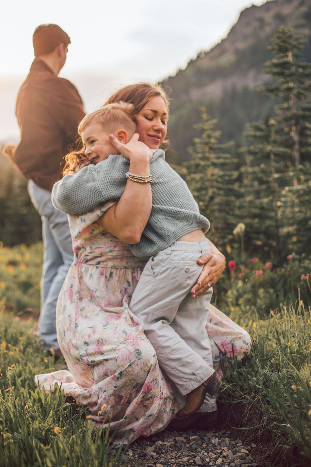 Mom holding son during their family adventure photography session at Mt. Rainier National Park near Seattle, Washington