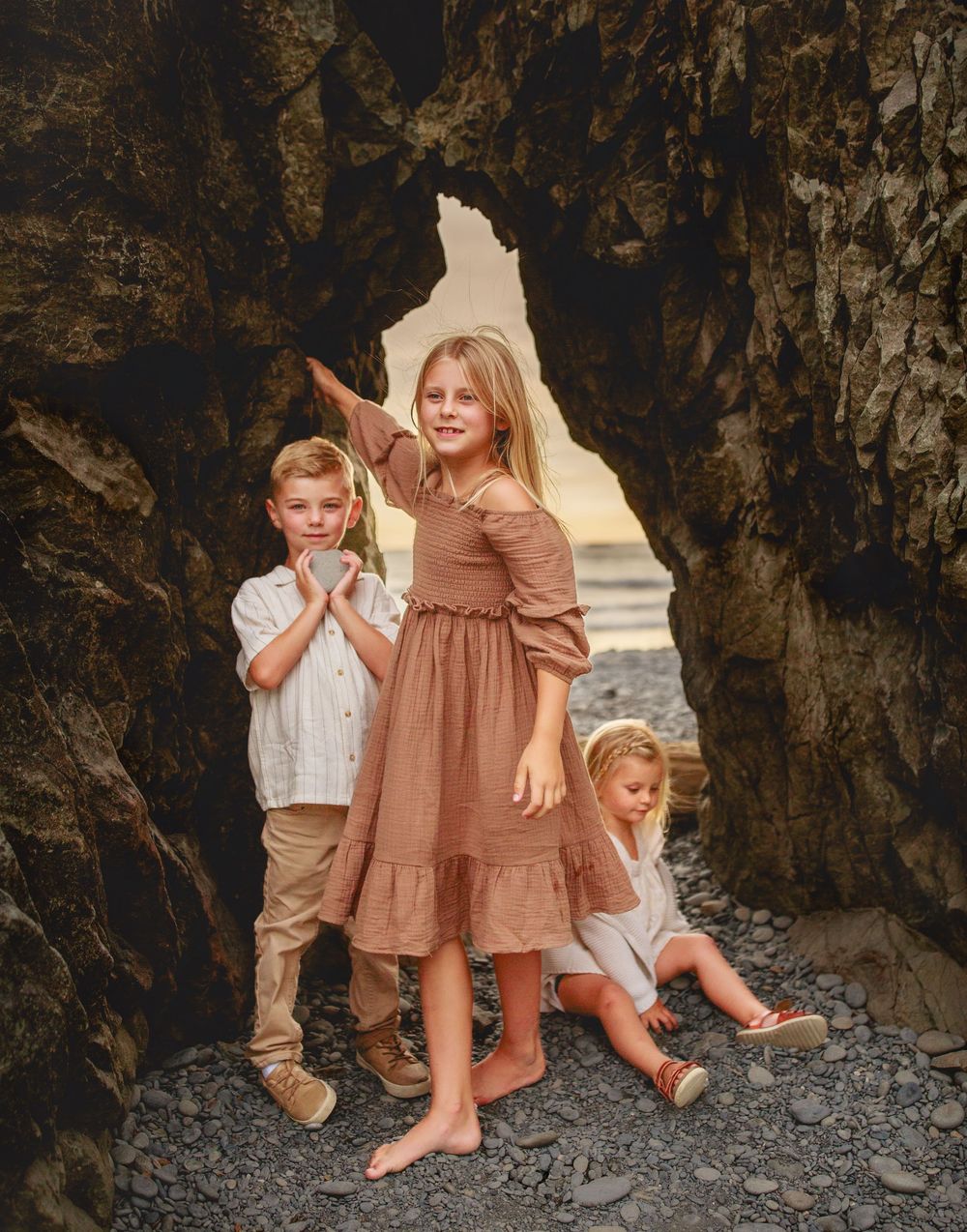 Siblings together during their family adventure photography session at Ruby Beach in Olympic National Park near Seattle, Washington