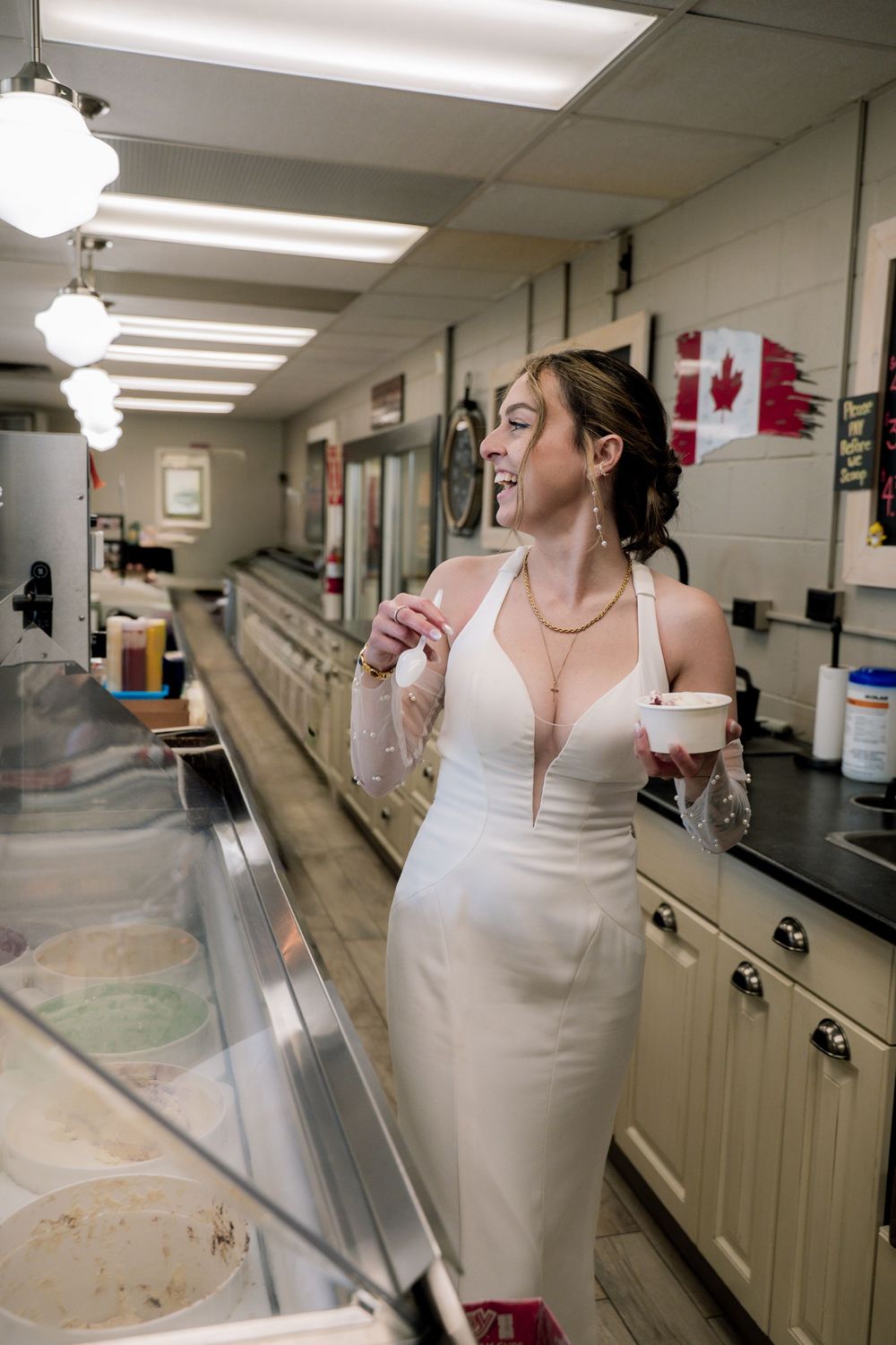 A sequence of photos showing someone in a white dress walking through a laboratory hallway with fluorescent lighting.